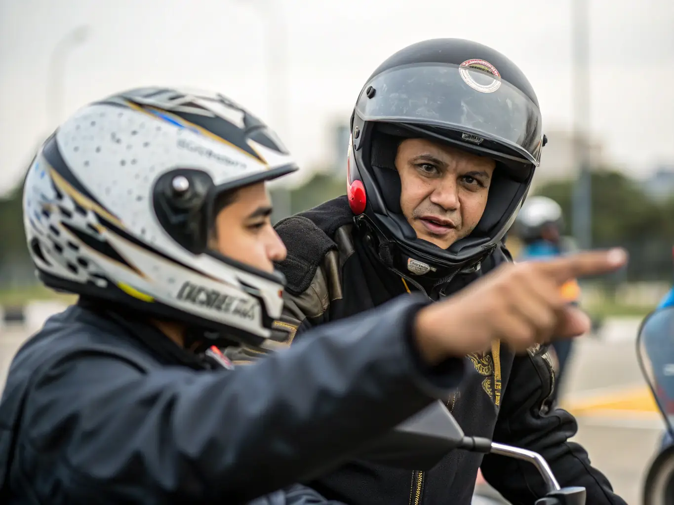 An image depicting a motorcycle training session, with an instructor guiding a participant through a skill-building exercise, emphasizing safety and expertise.