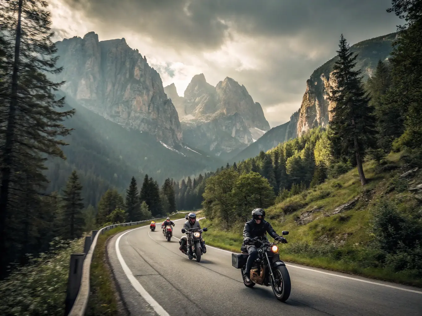 A group of motorcyclists riding through a winding mountain road, showcasing motorcycle tourism, with clear blue skies and lush greenery in the background.